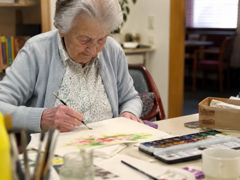 Residents enjoying art and painting at Burleigh House care home, Baldock