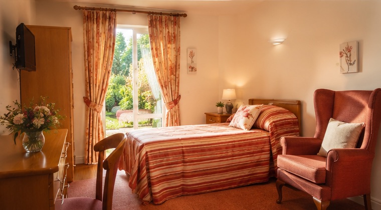 An en-suite bedroom at Burleigh House care home, Baldock